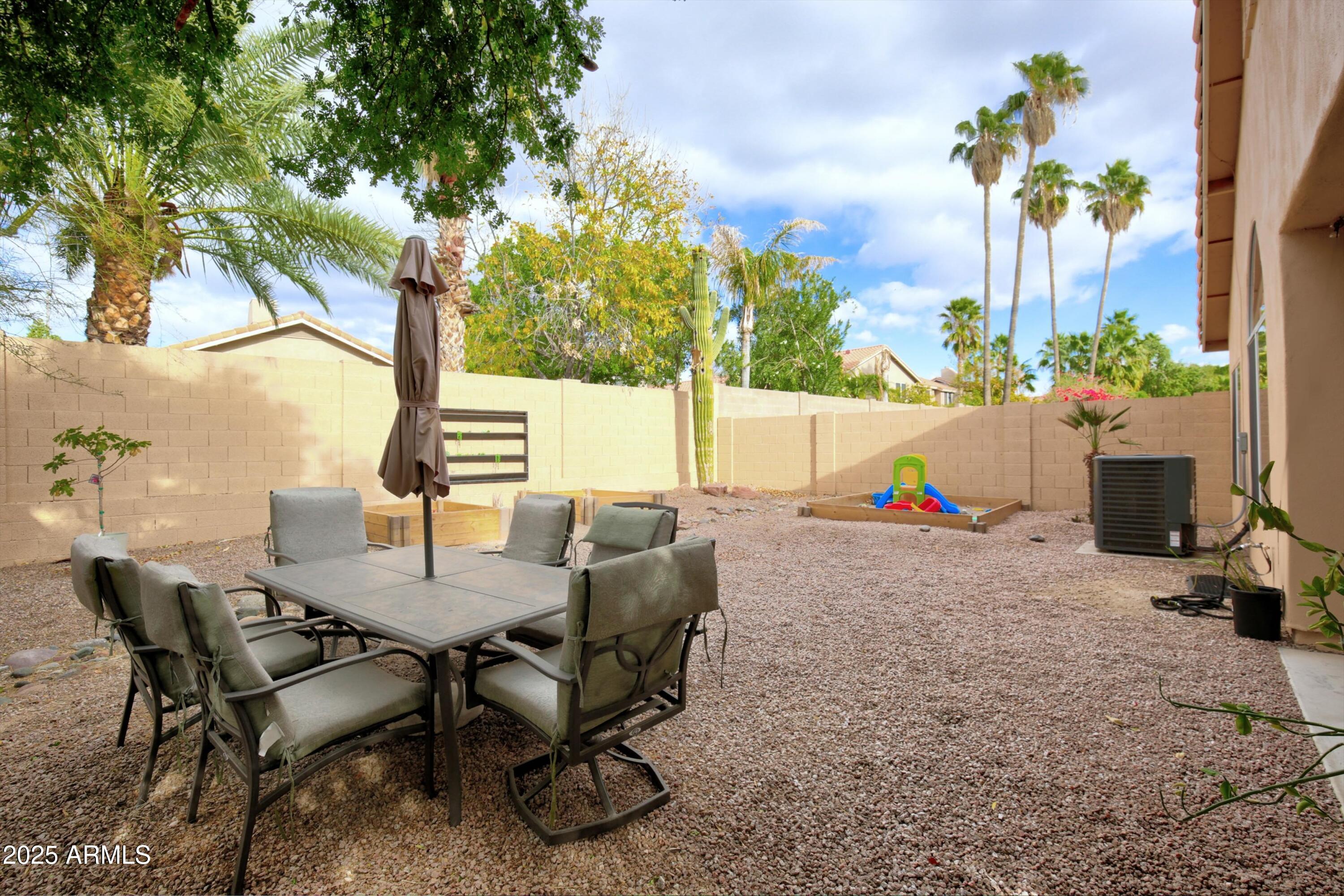 6458 East Raftriver Street Mesa, AZ 85215 - Photo 58 of 75 a view of outdoor space yard and patio