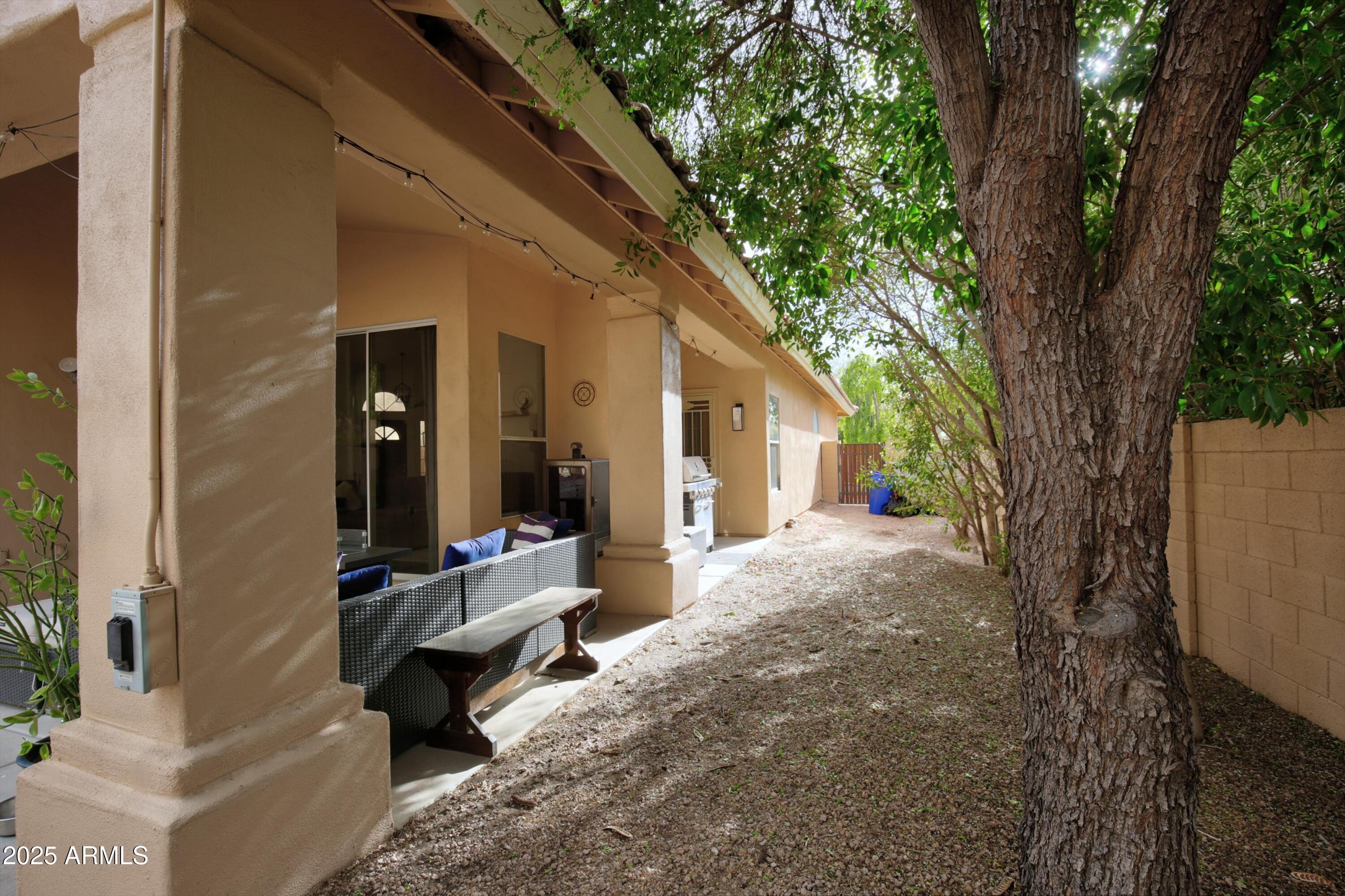 6458 East Raftriver Street Mesa, AZ 85215 - Photo 59 of 75 a view of a house with backyard and sitting area