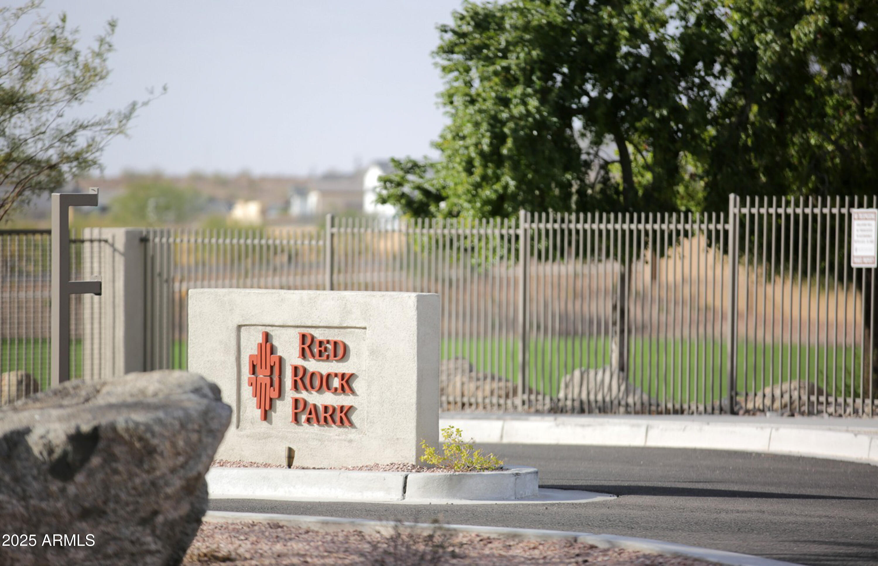 6458 East Raftriver Street Mesa, AZ 85215 - Photo 63 of 75 a sign on the side of a building