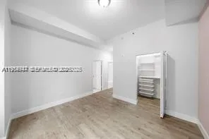 a view of a room with an empty space