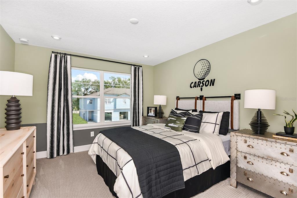 3350 Timber Xing Avenue Brandon, FL 33511 - Photo 14 of 21 a bedroom with double bed and a window