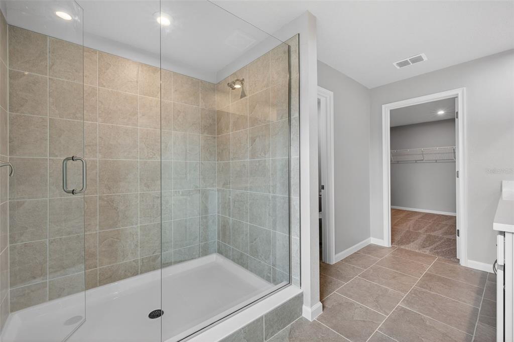 3350 Timber Xing Avenue Brandon, FL 33511 - Photo 21 of 35 a bathroom with a shower and a sink