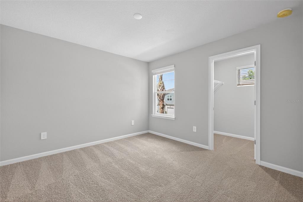 3350 Timber Xing Avenue Brandon, FL 33511 - Photo 24 of 35 an empty room with windows and closet