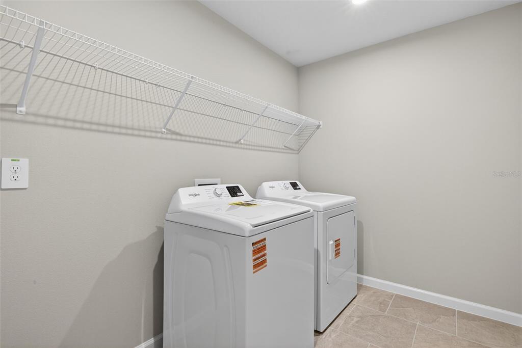 3350 Timber Xing Avenue Brandon, FL 33511 - Photo 27 of 35 a utility room with dryer and washer