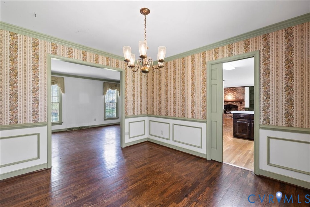 11716 Ivywood Road Chester, VA 23831 - Photo 6 of 38 a view of a kitchen with a dishwasher cabinets and wooden floor