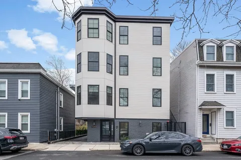a car parked in front of a building