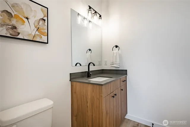 a view of a hallway with seating area