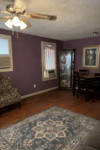 a view of livingroom with furniture and window