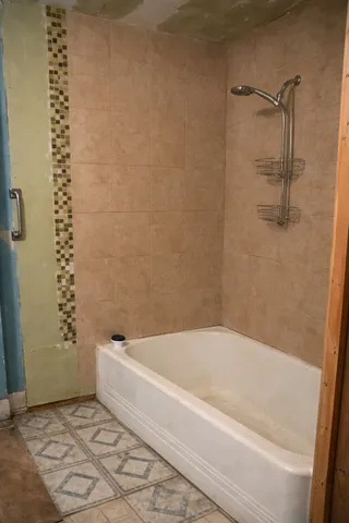 a bathroom with a bathtub