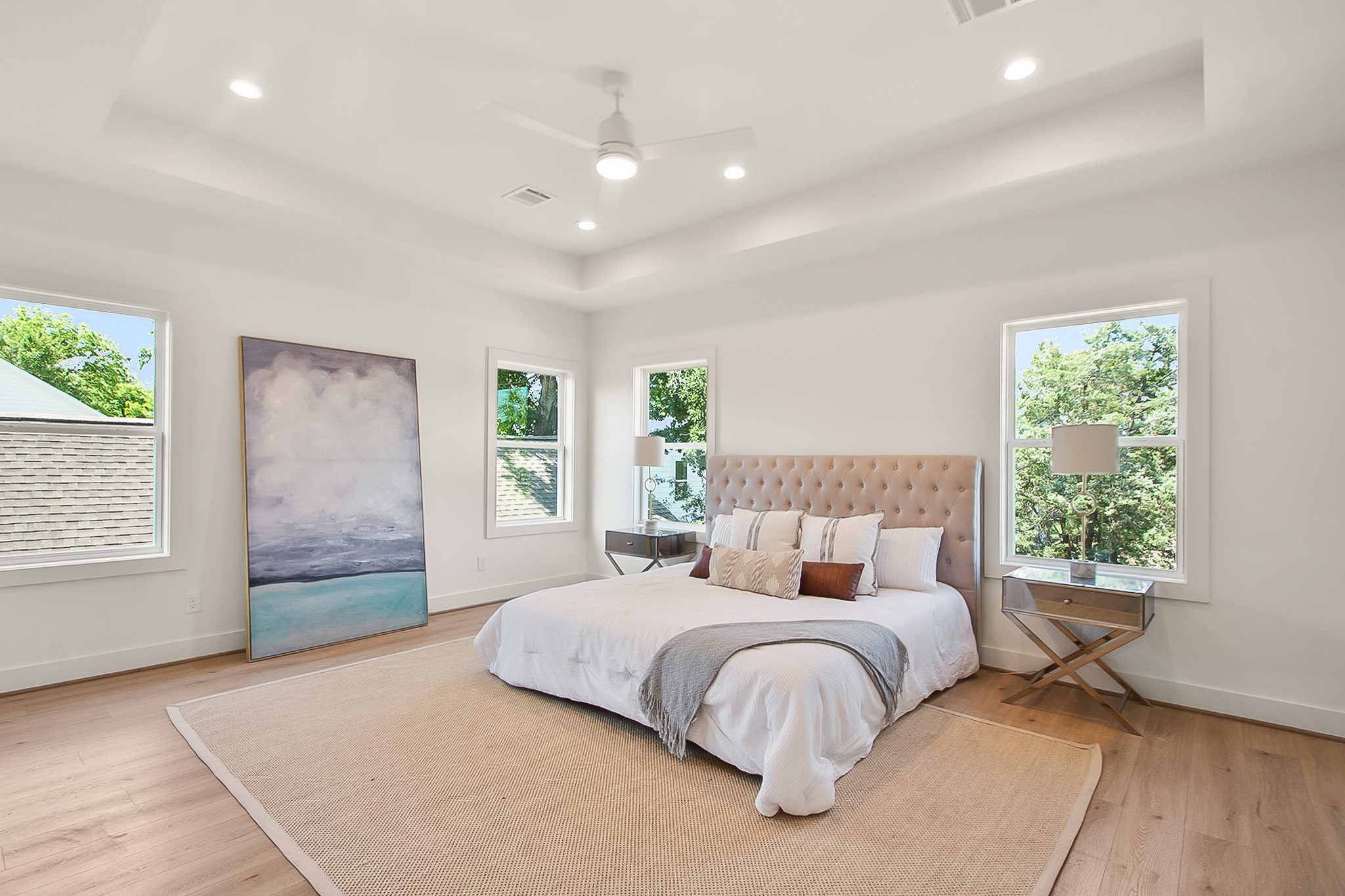 1109 Tabor Street Houston, TX 77009 - Photo 17 of 38 a bedroom with a large bed and a window
