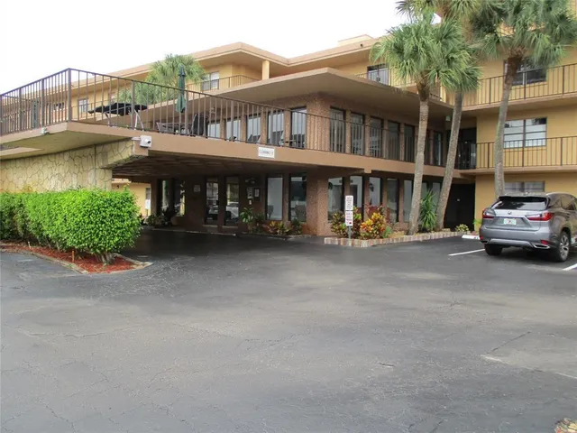 a car parked in front of a house
