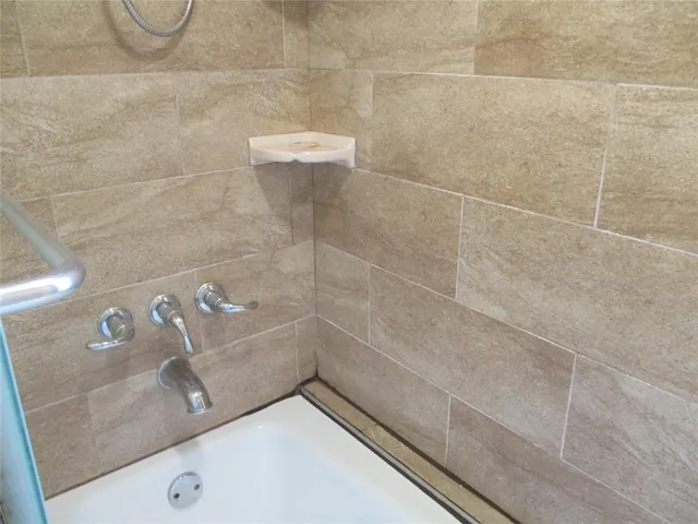 a bathroom with a bathtub