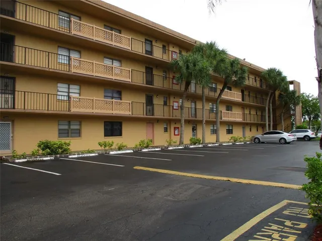 a front view of a building with street view