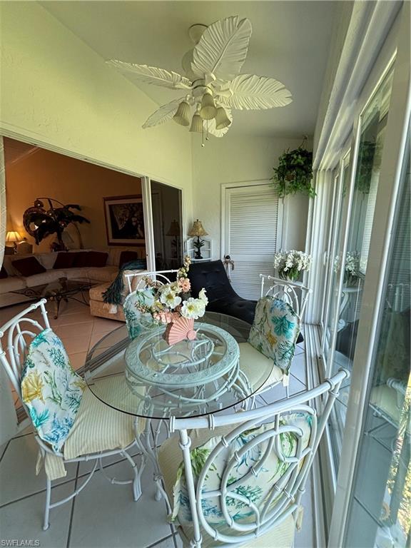 Undisclosed Address Naples, FL 34112 - Photo 30 of 35 Sunroom / solarium with tile patterned floors