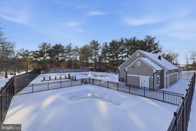 a view of terrace with trees in the background
