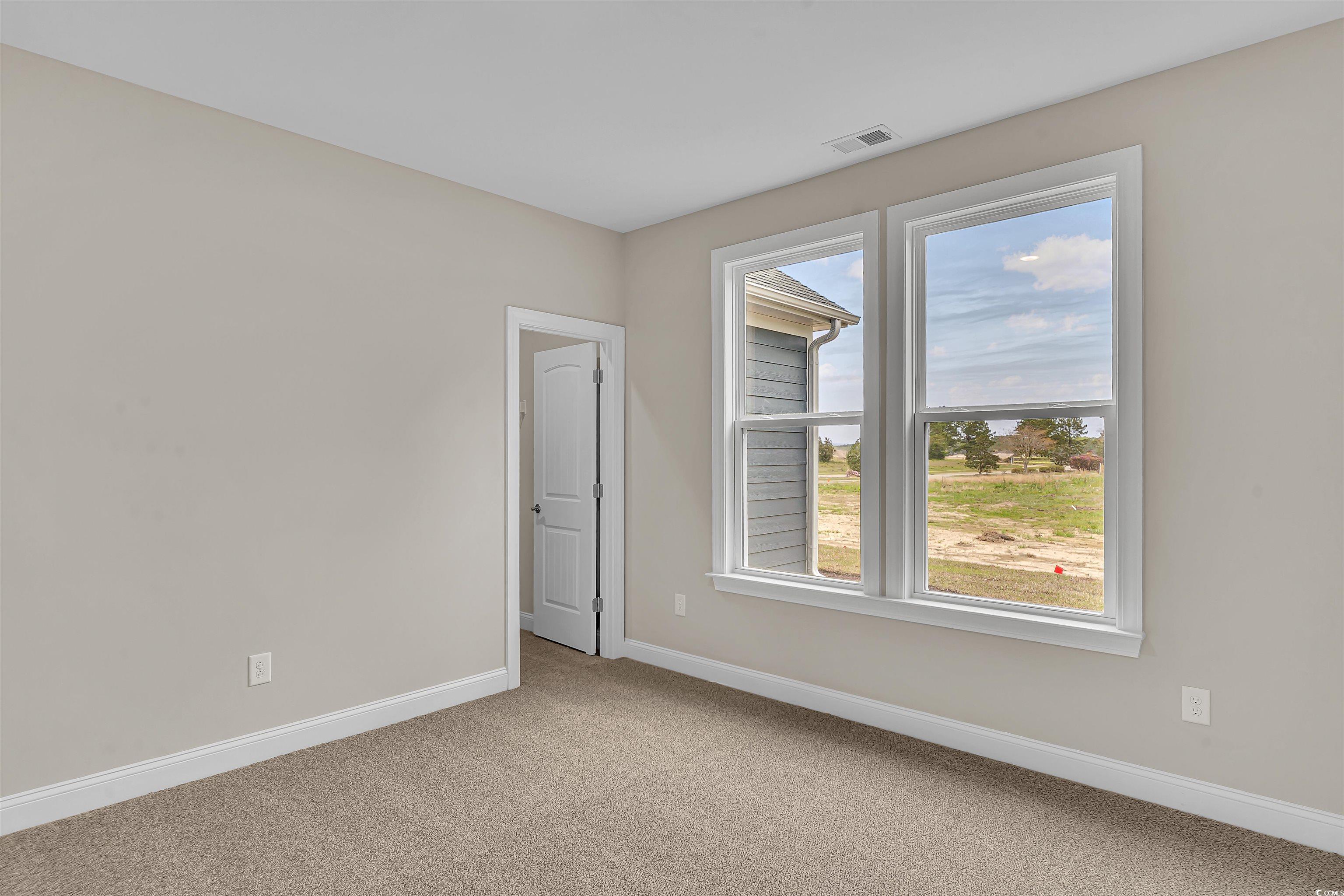 550 Beachside Circle Calabash, NC 28467 - Photo 30 of 39 View of carpeted empty room