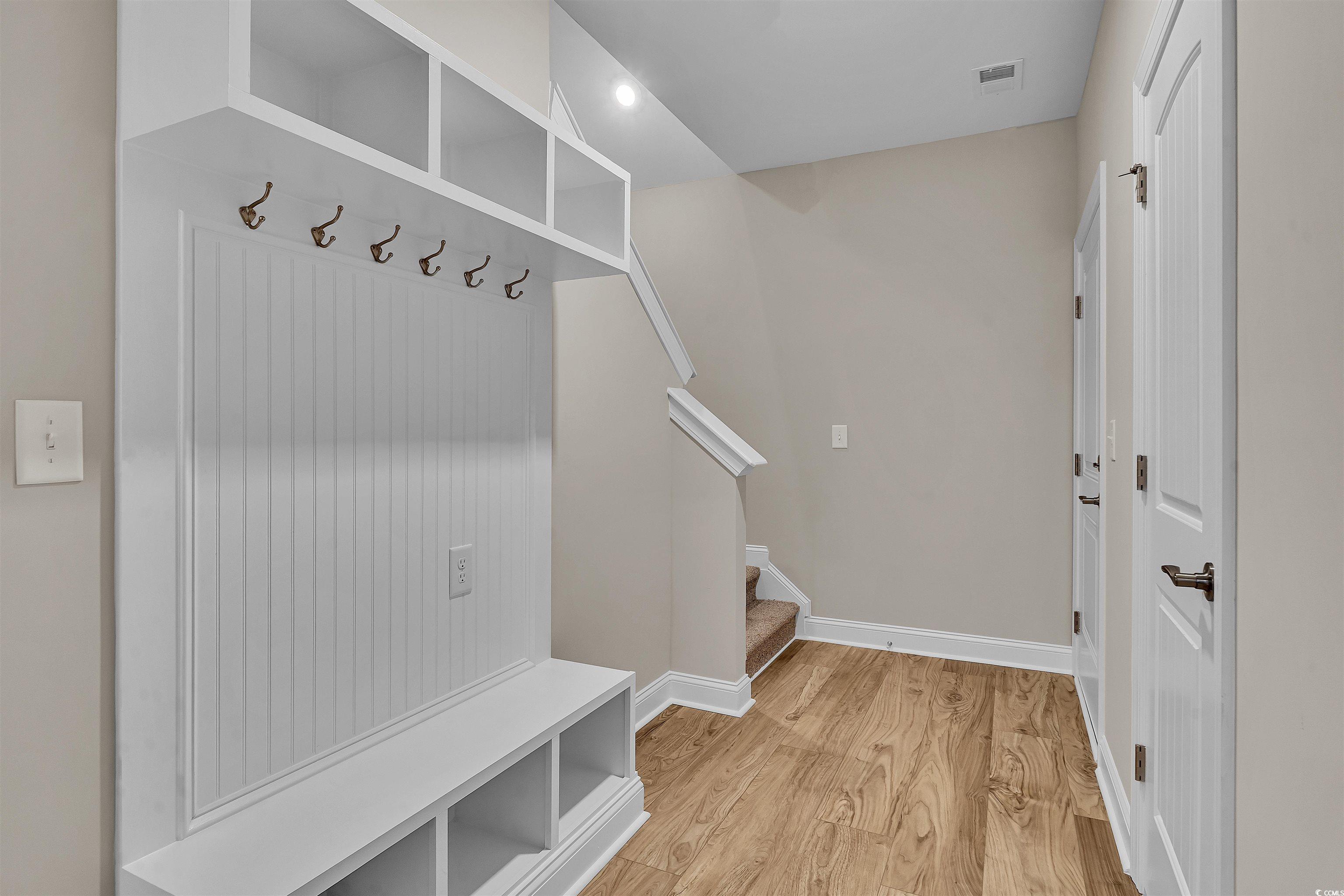 550 Beachside Circle Calabash, NC 28467 - Photo 32 of 39 Mudroom with light hardwood / wood-style flooring