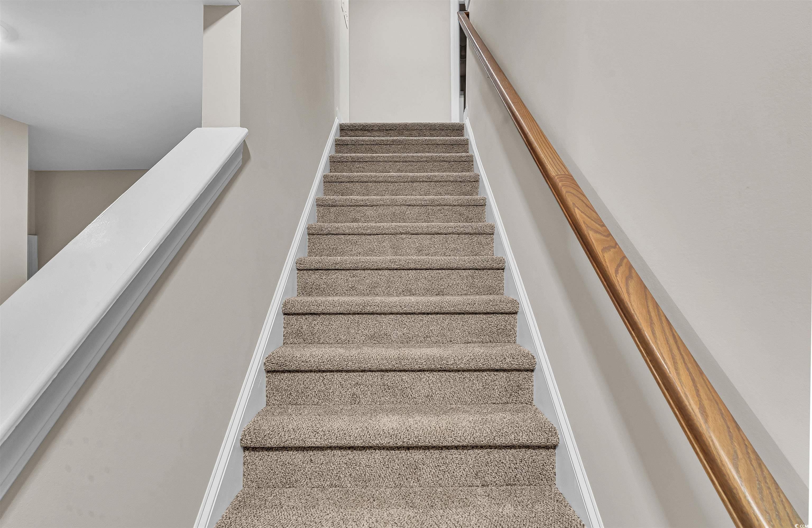 550 Beachside Circle Calabash, NC 28467 - Photo 33 of 39 Staircase featuring carpet