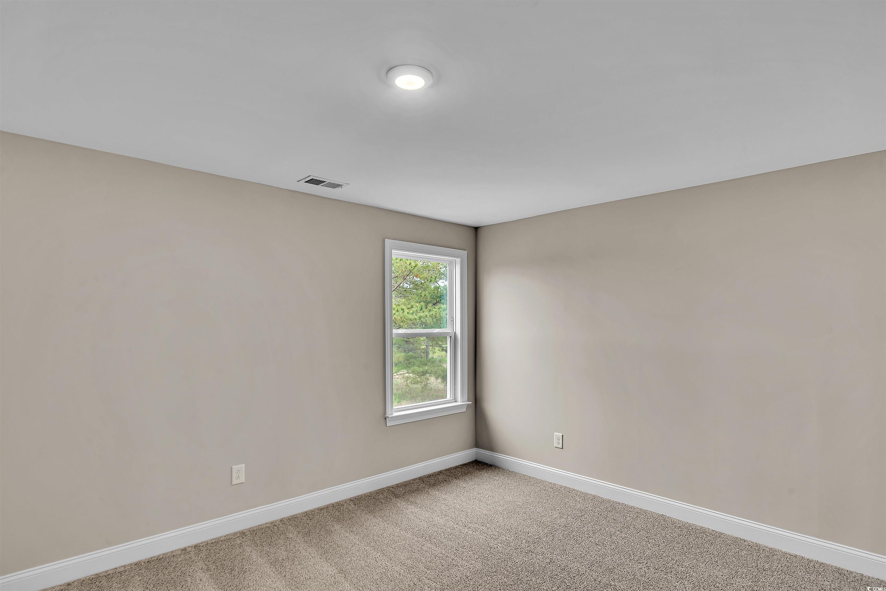 550 Beachside Circle Calabash, NC 28467 - Photo 38 of 39 Unfurnished room with carpet floors