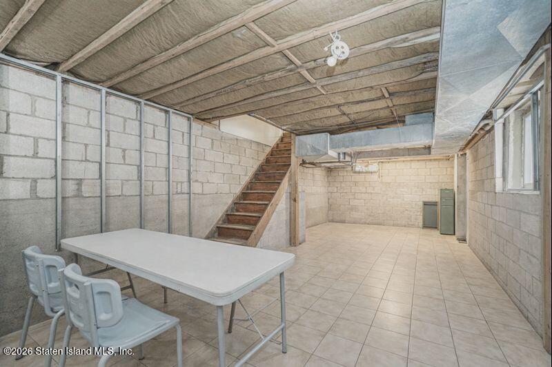 225 Colony Avenue Staten Island, NY 10306 - Photo 19 of 20 a view of a patio with table and chairs
