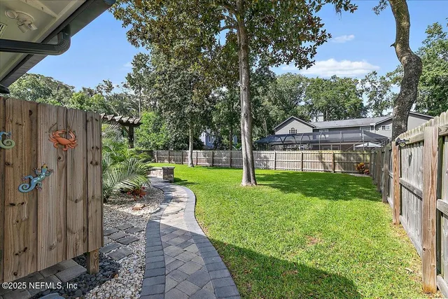 a view of a backyard with a garden
