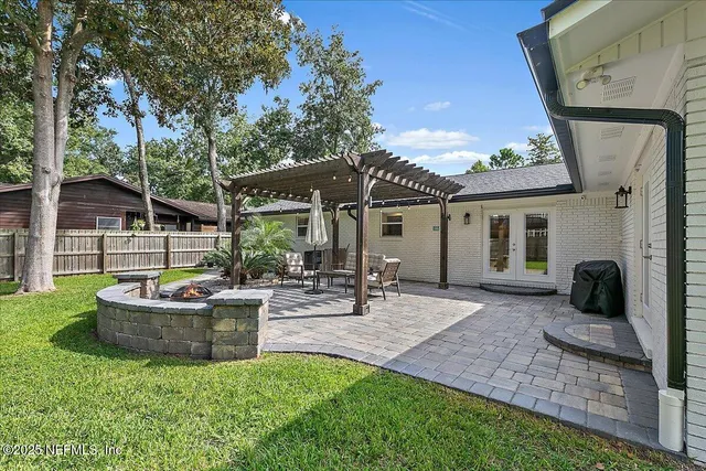 a backyard of a house with seating space