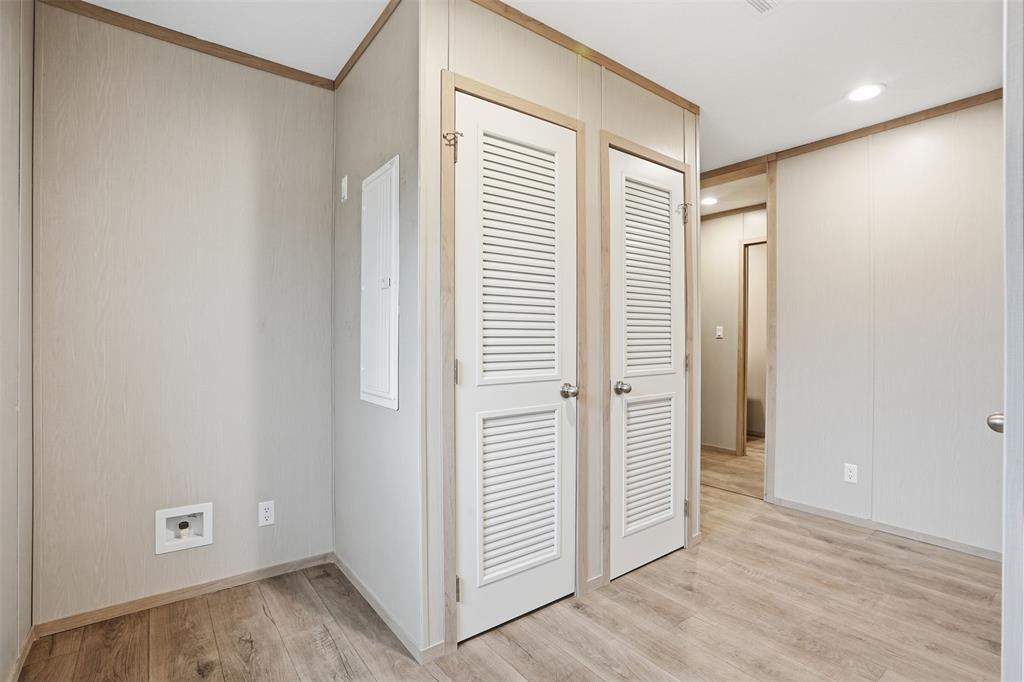 2000 Atticus Court Springtown, TX 76082 - Photo 18 of 25 an empty room with wooden floor and windows