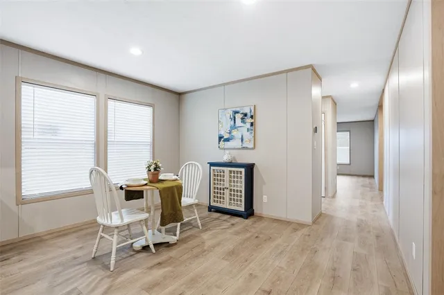 a workspace with furniture and window