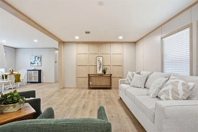 a living room with furniture and a couch