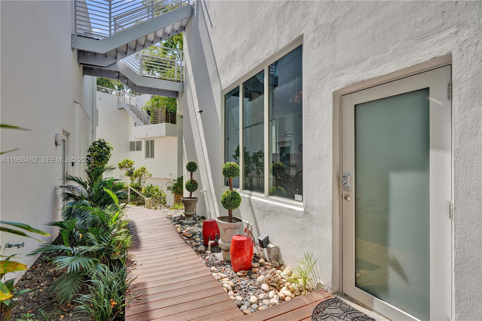 3126 Center Street, Unit 8 Coconut Grove, FL 33133 - Photo 2 of 50 a view of a entryway door of the house