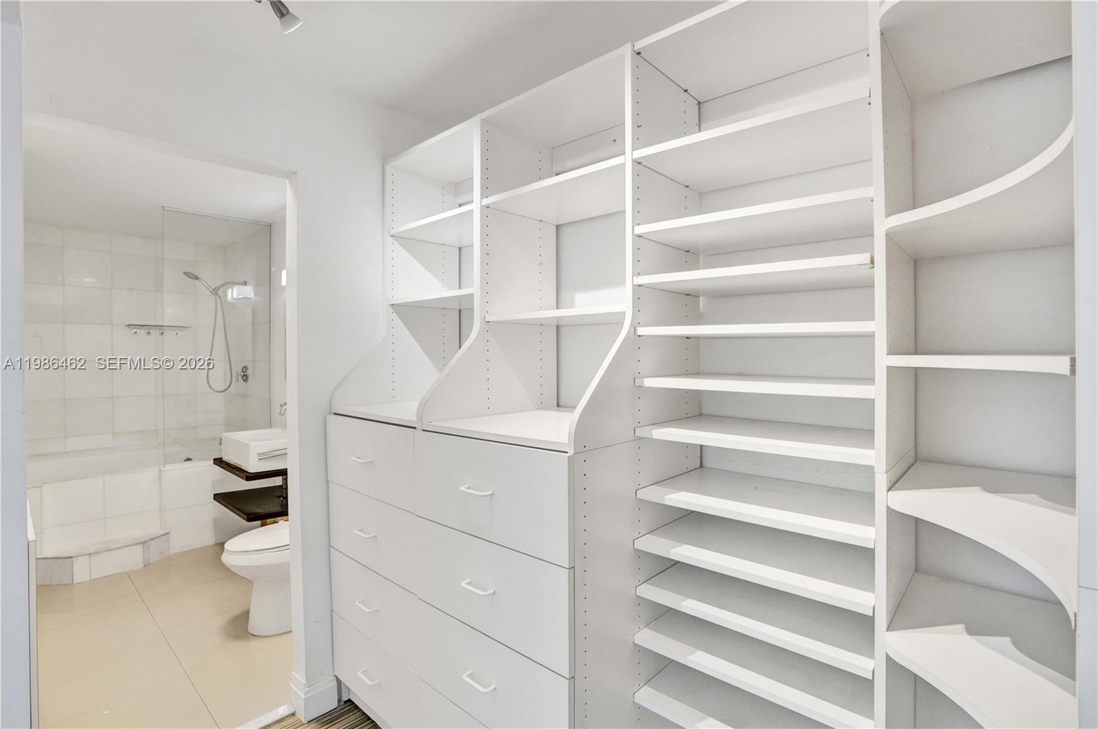 3126 Center Street, Unit 8 Coconut Grove, FL 33133 - Photo 33 of 50 a bathroom with a toilet and a shower