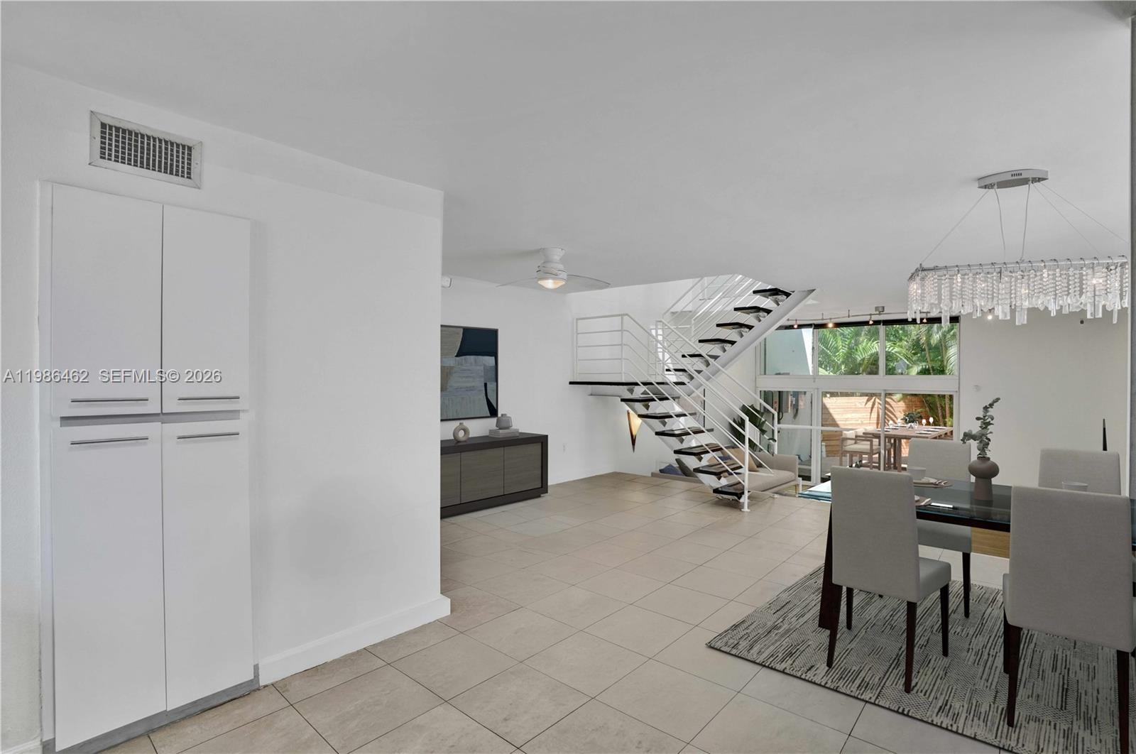 3126 Center Street, Unit 8 Coconut Grove, FL 33133 - Photo 4 of 50 a living room with furniture and a table