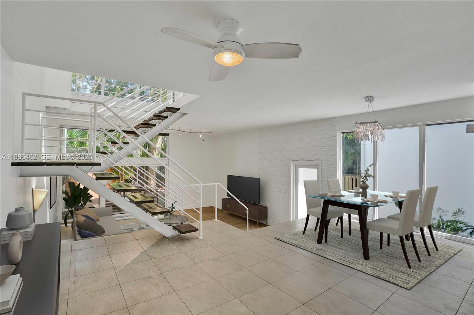 3126 Center Street, Unit 8 Coconut Grove, FL 33133 - Photo 10 of 50 a view of a livingroom with furniture and a table