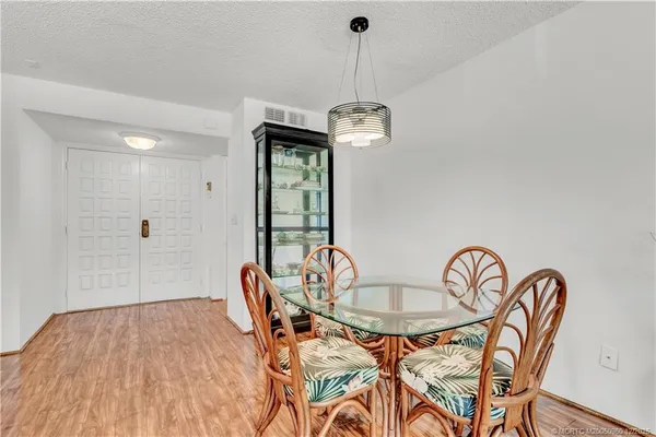 a kitchen with stainless steel appliances granite countertop a sink stove and microwave