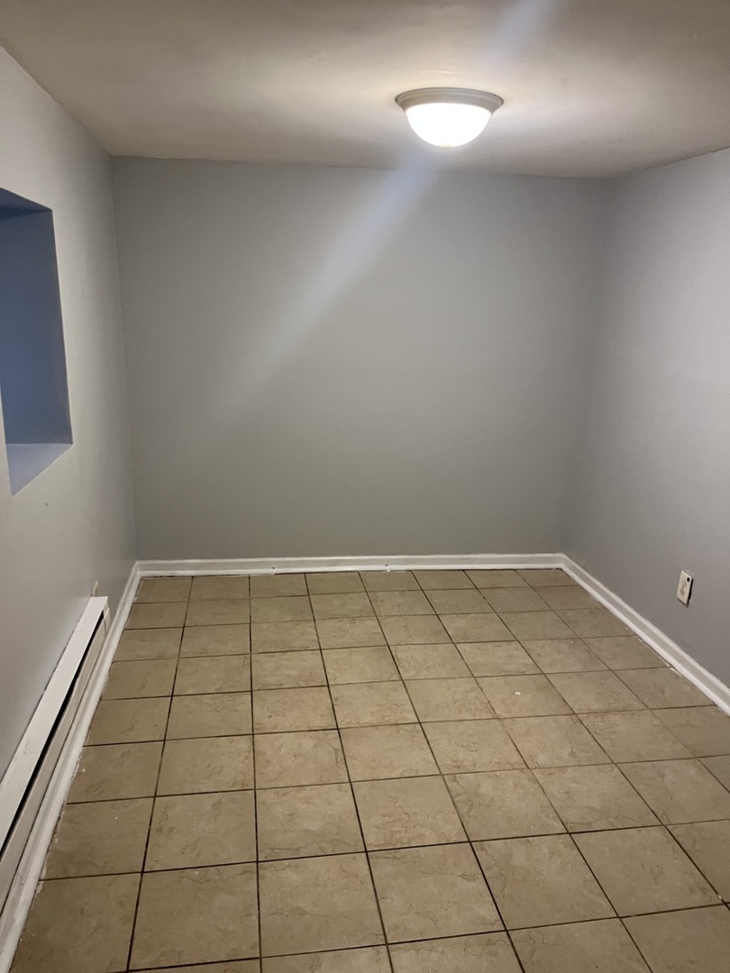 4039 West Wilcox Street, Unit GARDEN Chicago, IL 60624 - Photo 3 of 8