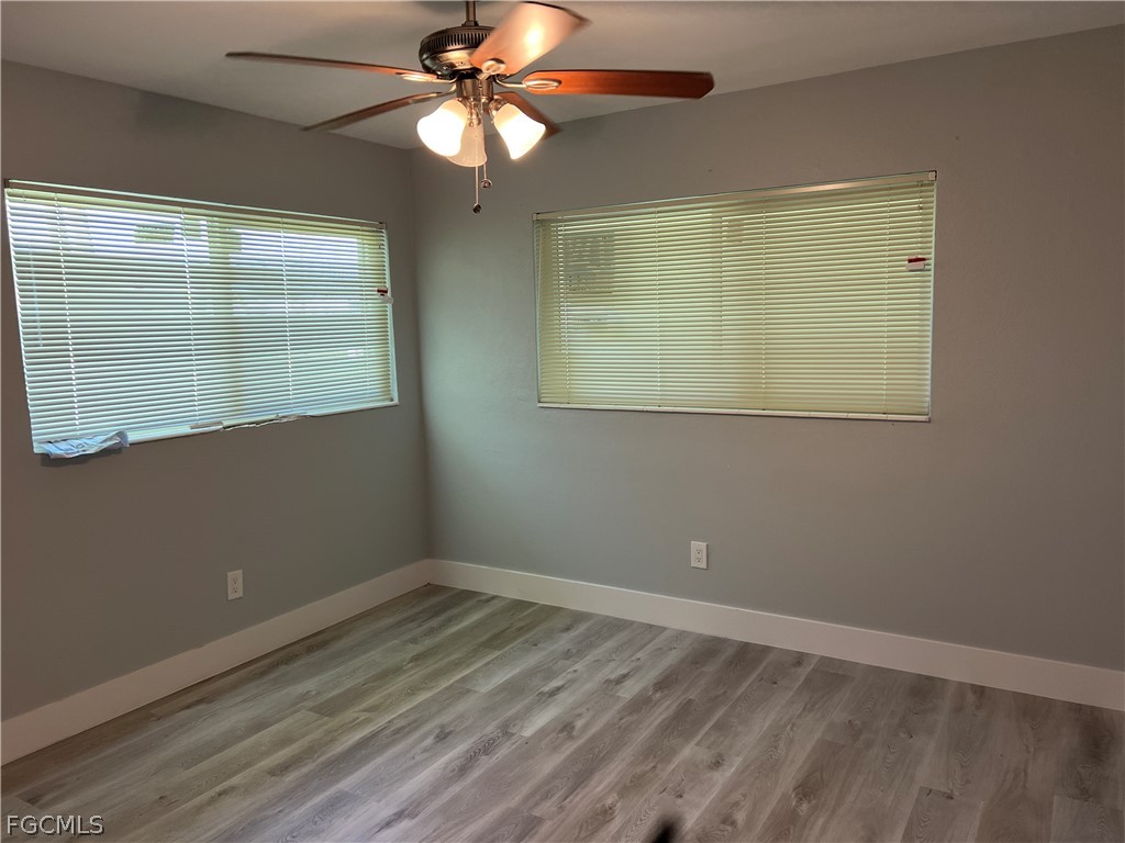 337 Tudor Drive, Unit R Cape Coral, FL 33904 - Photo 10 of 13 a view of an empty room with a window