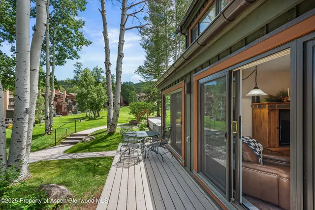 a view of porch with a yard