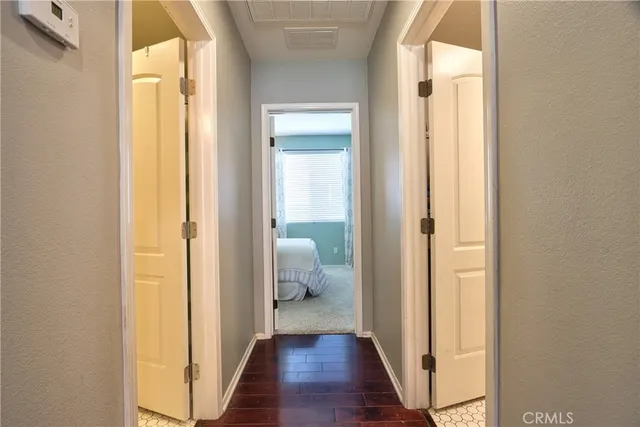 a view of a bathroom from a hallway