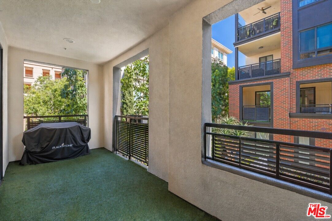 12883 West Runway Road, Unit 1 Playa Vista, CA 90094 - Photo 12 of 36 a view of a house with a yard