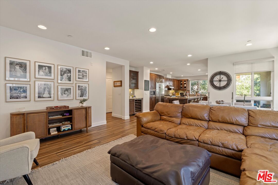 12883 West Runway Road, Unit 1 Playa Vista, CA 90094 - Photo 15 of 36 a living room with furniture and a table