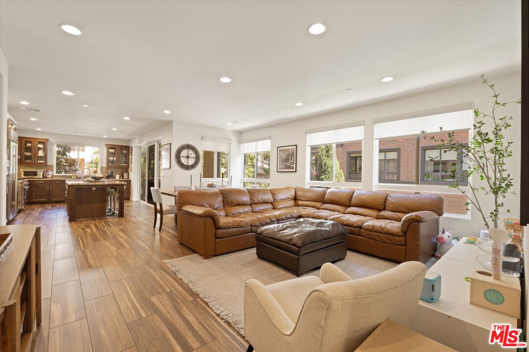 12883 West Runway Road, Unit 1 Playa Vista, CA 90094 - Photo 16 of 36 a living room with furniture and a large window