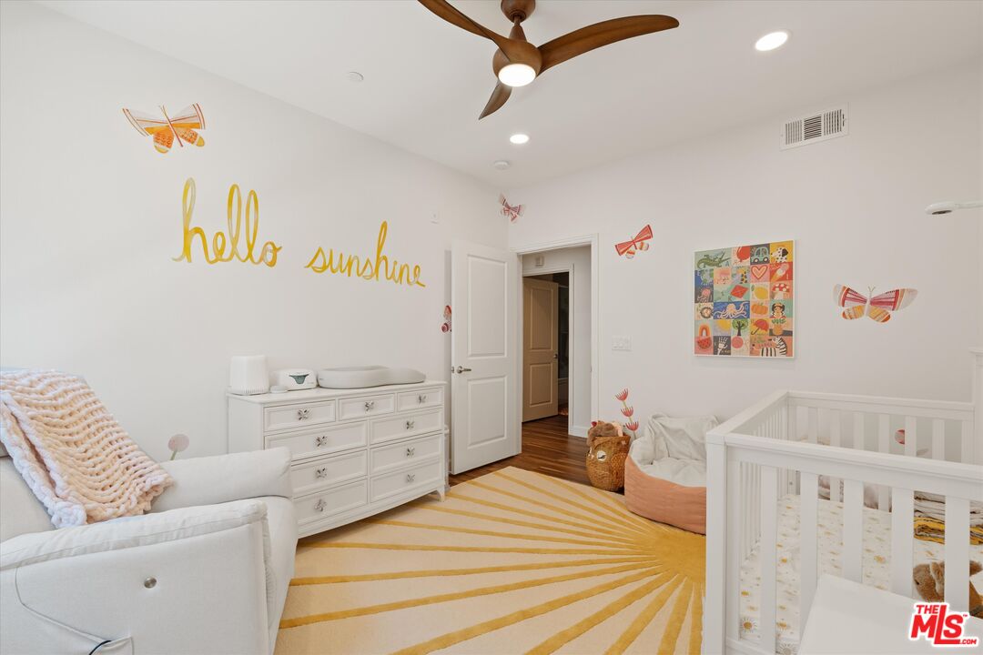 12883 West Runway Road, Unit 1 Playa Vista, CA 90094 - Photo 22 of 36 a bedroom with a bed and a couch