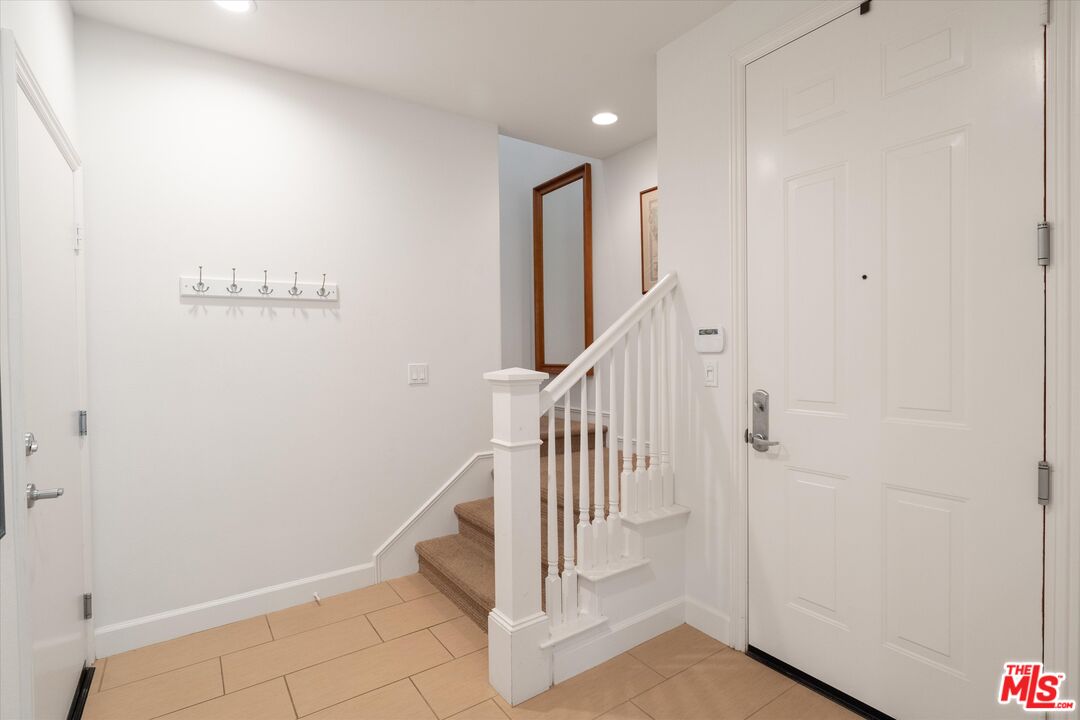 12883 West Runway Road, Unit 1 Playa Vista, CA 90094 - Photo 28 of 36 a view of entryway with wooden floor and stairs