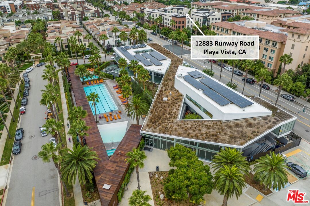 12883 West Runway Road, Unit 1 Playa Vista, CA 90094 - Photo 35 of 36 an aerial view of a house with a yard and sitting area