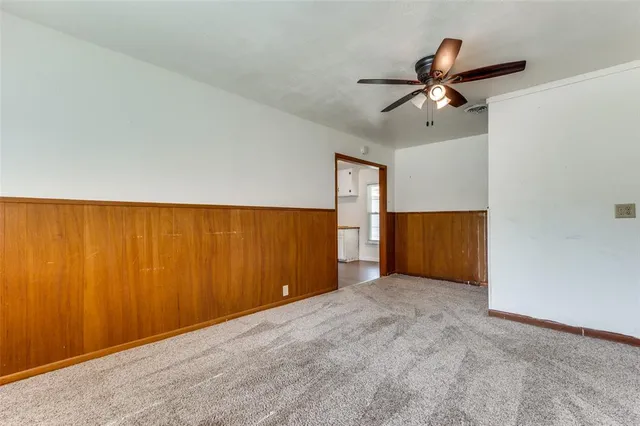a view of a big room with carpet
