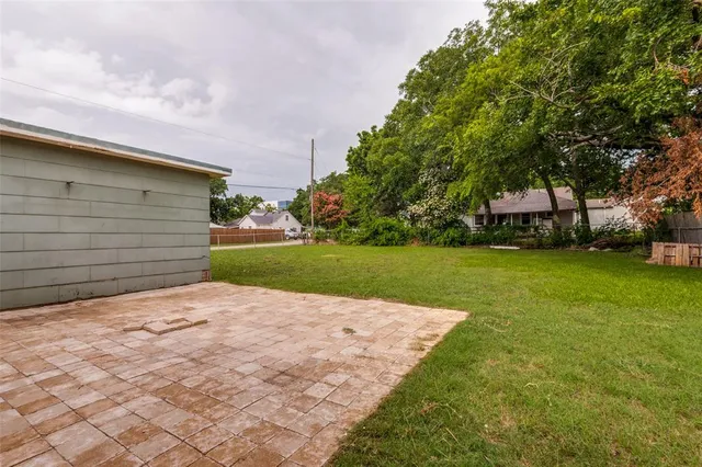 a view of a backyard with a garden