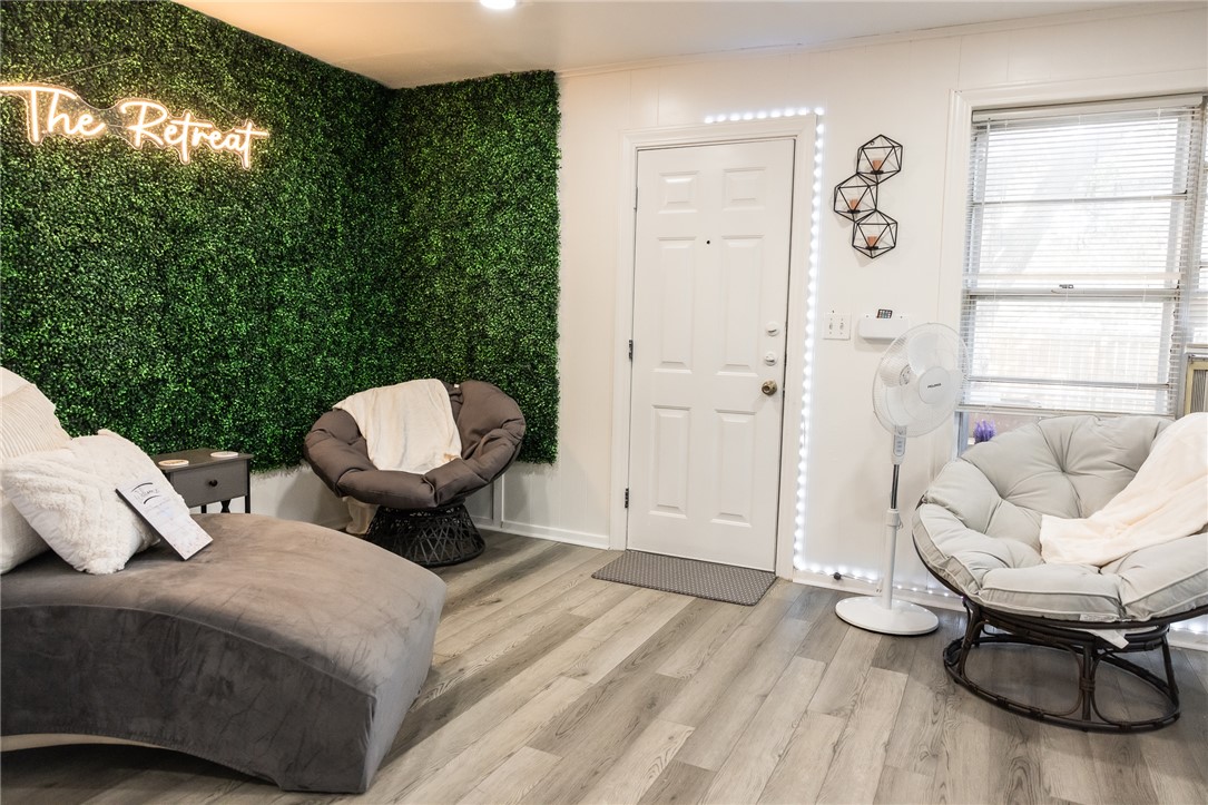 1308 Antone Street Bryan, TX 77803 - Photo 16 of 36 a living room with furniture a window and a potted plant