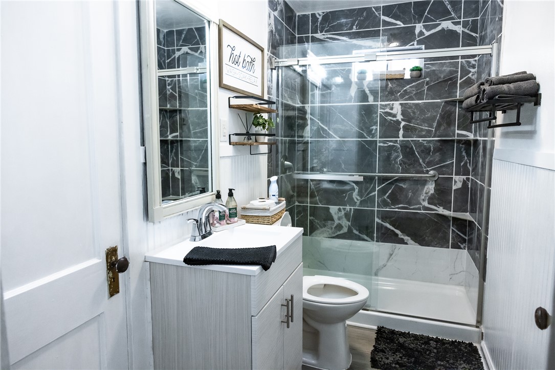 1308 Antone Street Bryan, TX 77803 - Photo 23 of 36 a bathroom with a sink toilet and shower