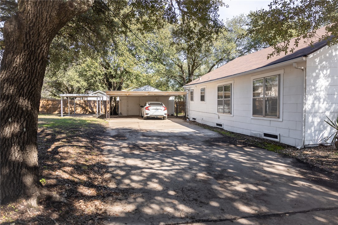 1308 Antone Street Bryan, TX 77803 - Photo 34 of 36 a view of a house with a yard