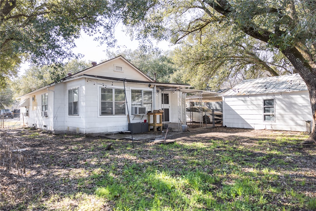 1308 Antone Street Bryan, TX 77803 - Photo 35 of 36 a view of a house with a yard